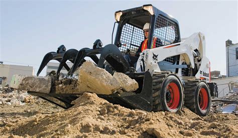 how to operate small skid steer|excavating with a skid steer.